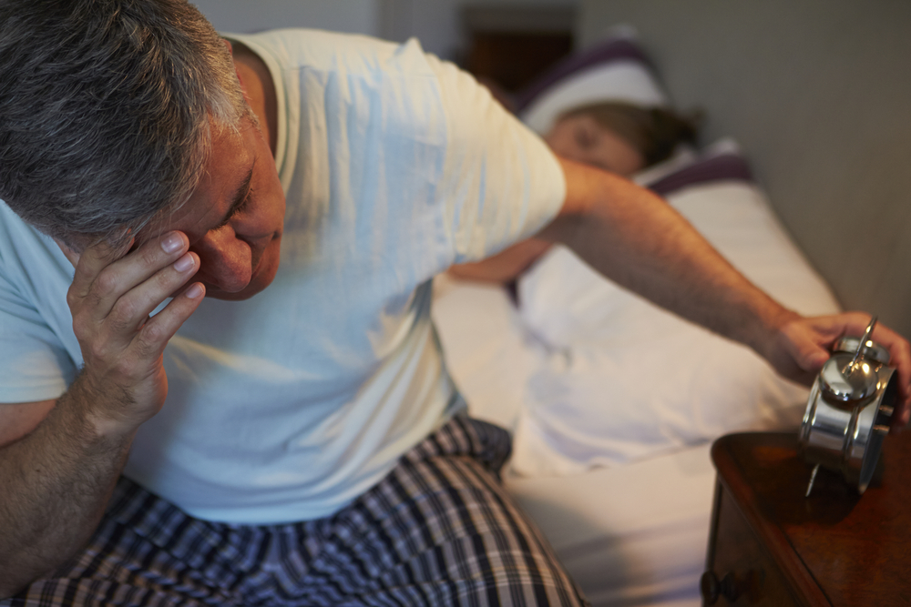 Exhausted person awake at night