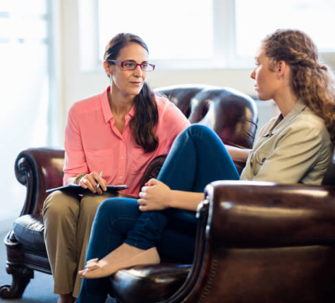 Therapist with client